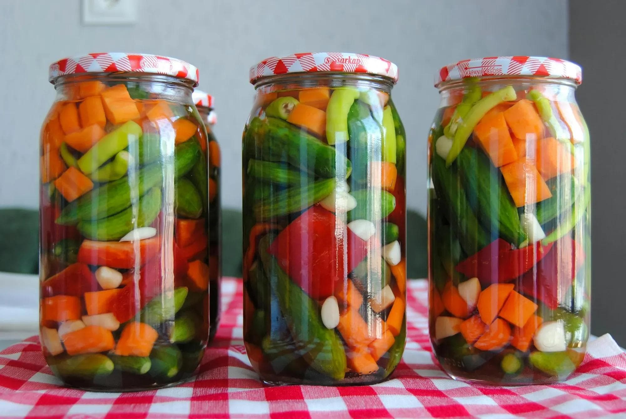 Pickled vegetables in jars