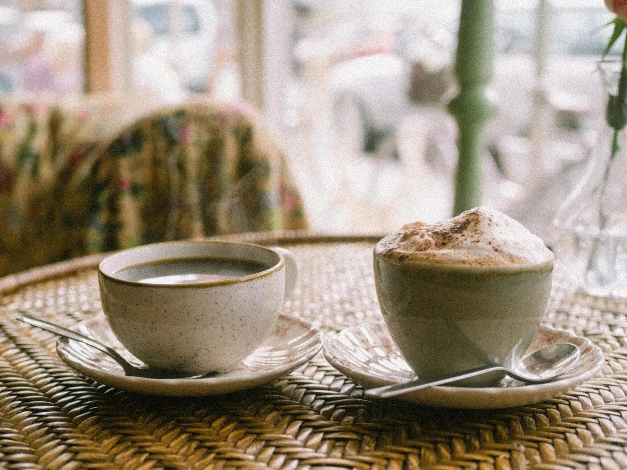 Two coffees on a table
